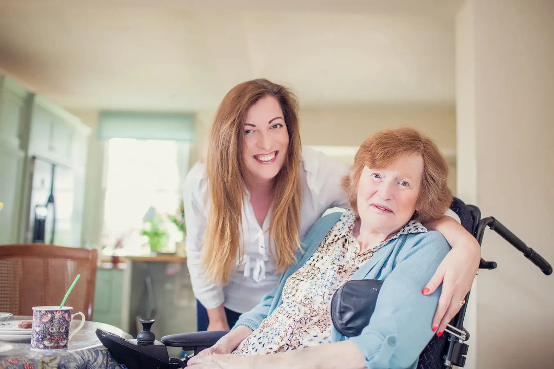 Elderly disabled person receiving care at home in a comfortable environment compared with residential care setting